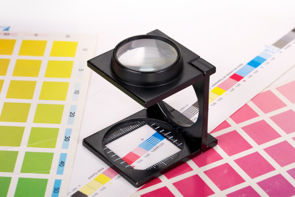 Loupe with CMYK color scales image