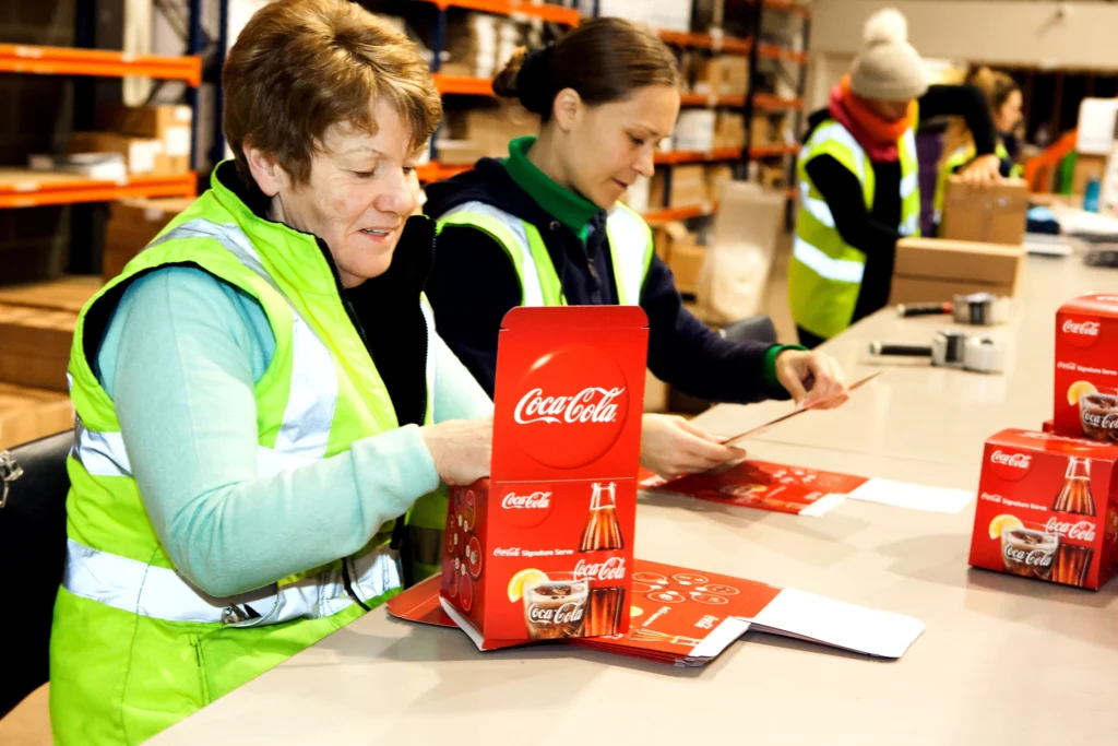 Spectrum worker kitting for Coca Cola