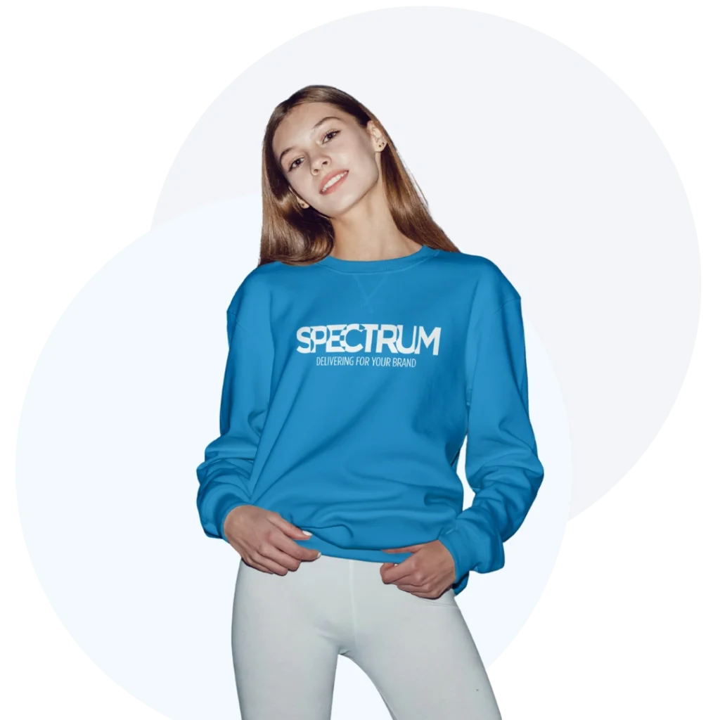 girl wearing spectrum jumper